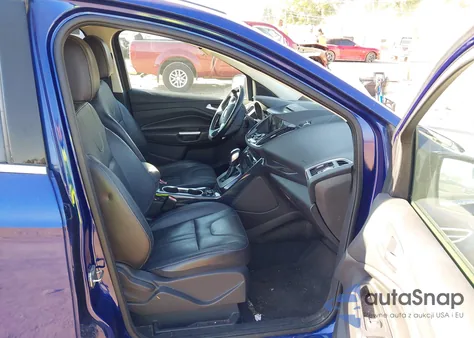 2013 Ford Escape Titanium z USA, uszkodzony, nr VIN 1FMCU0J90DUA09113